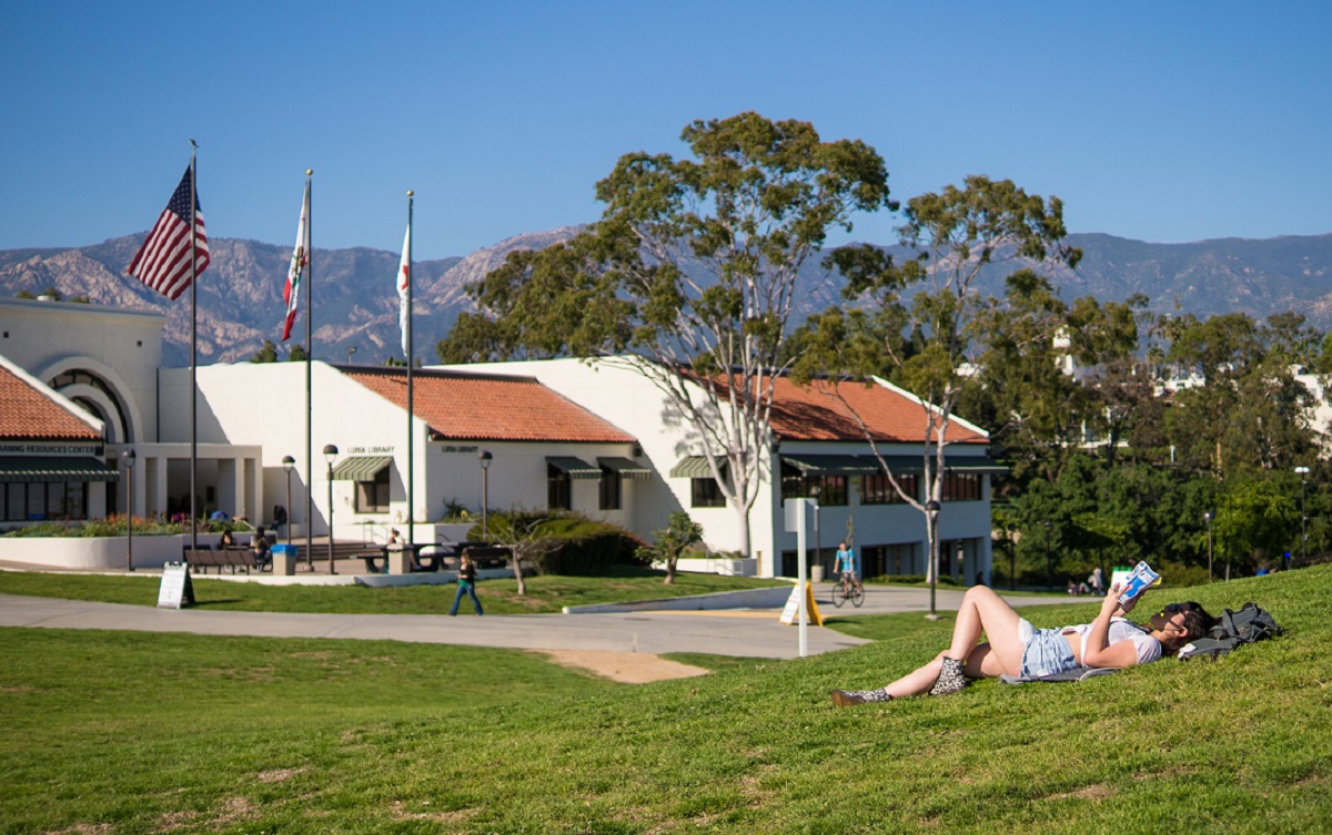 Student Reading in front of SBCC library