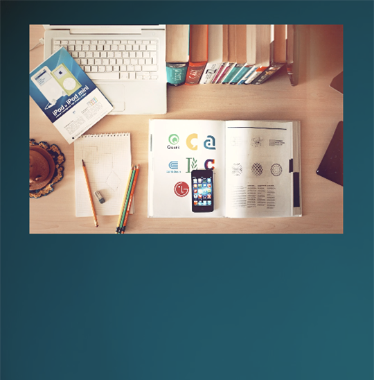 image of study materials such as books phone notebook