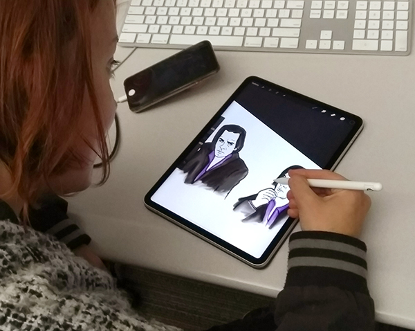 Graphic Design student with iPad
